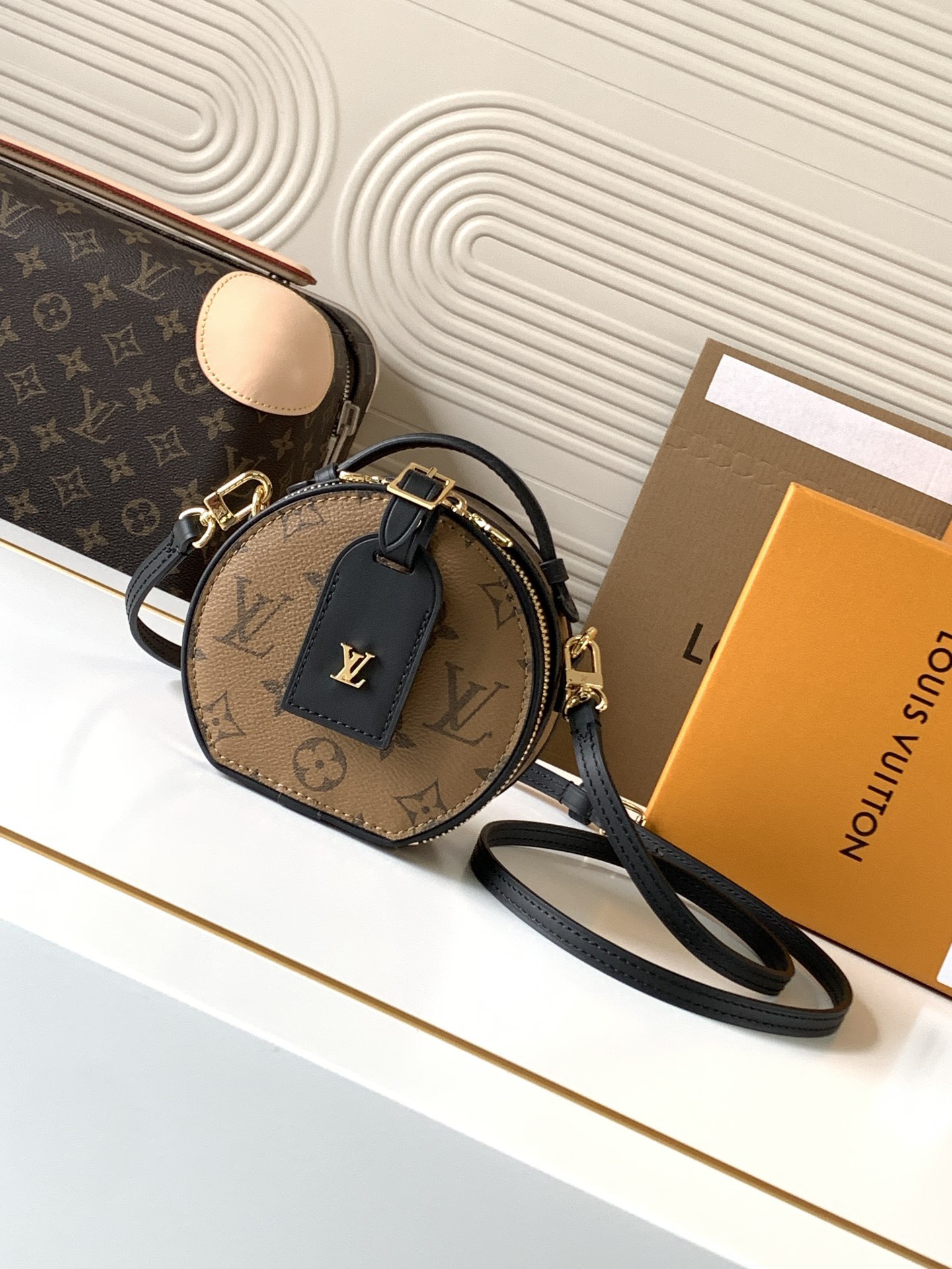 Louis Vuitton's mini boite chapeau bag M68276