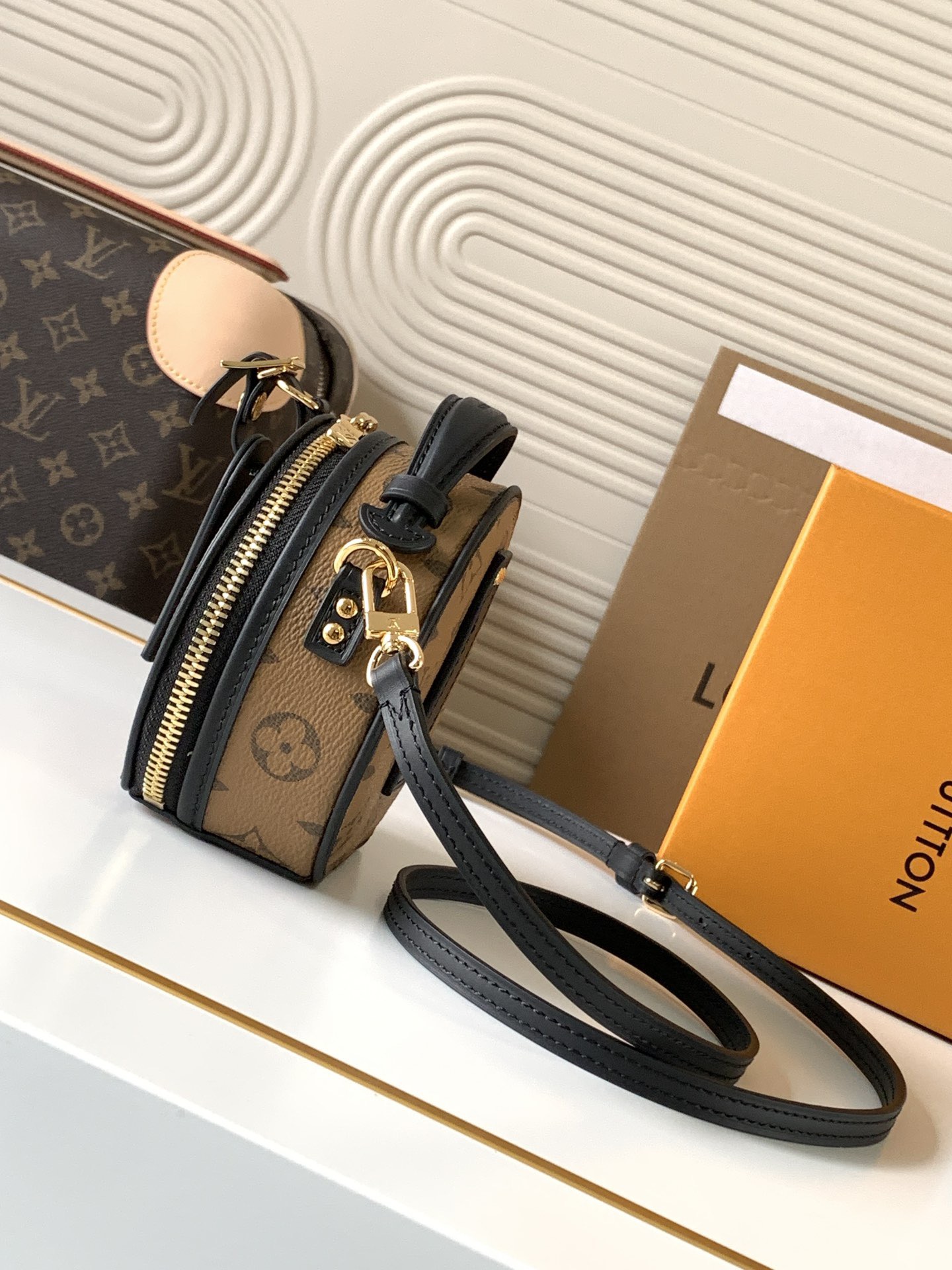 Louis Vuitton's mini boite chapeau bag M68276